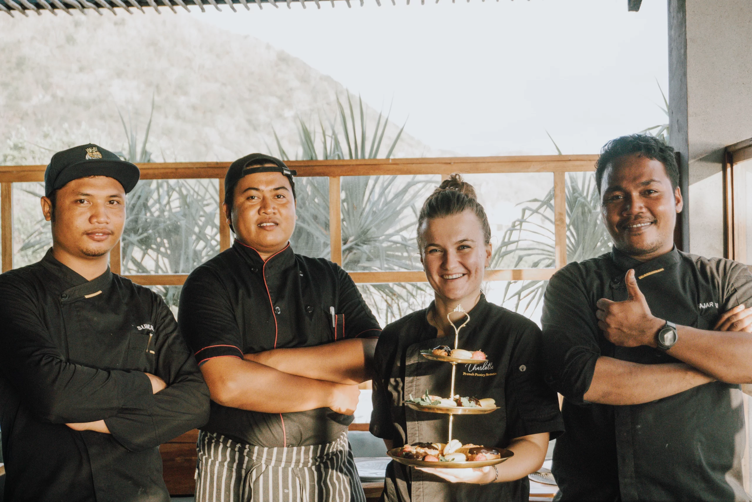 lombok-team-tea-time-stand Resort kitchen team with the pastry instructor, presenting the new tea-time stand (Lombok)